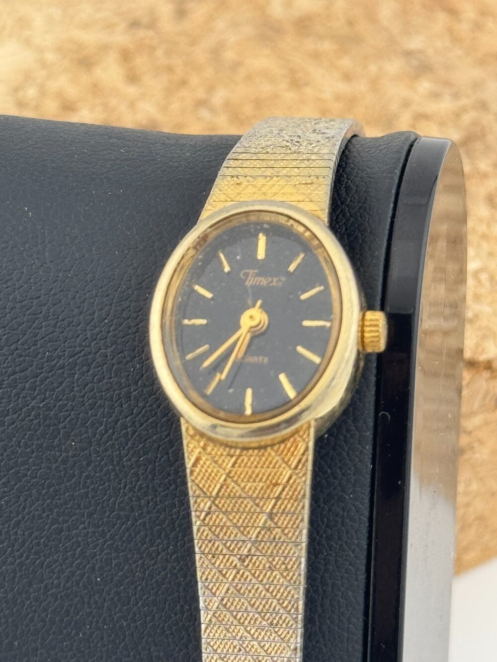 Vintage Timex Ladies Quartz Watch Oval Gold-Tone Black Dial Integrated Textured